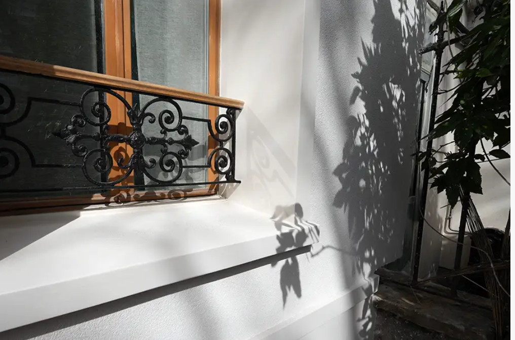 Fenetre en bois avec isolation par l'extérieur